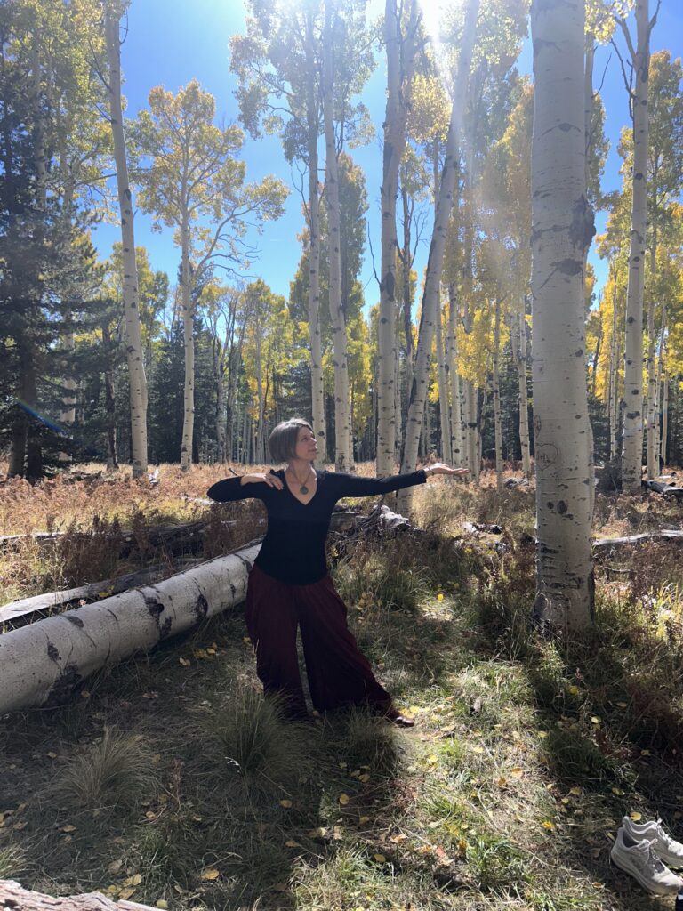 qigong practice with gentle movement and breath awareness in nature